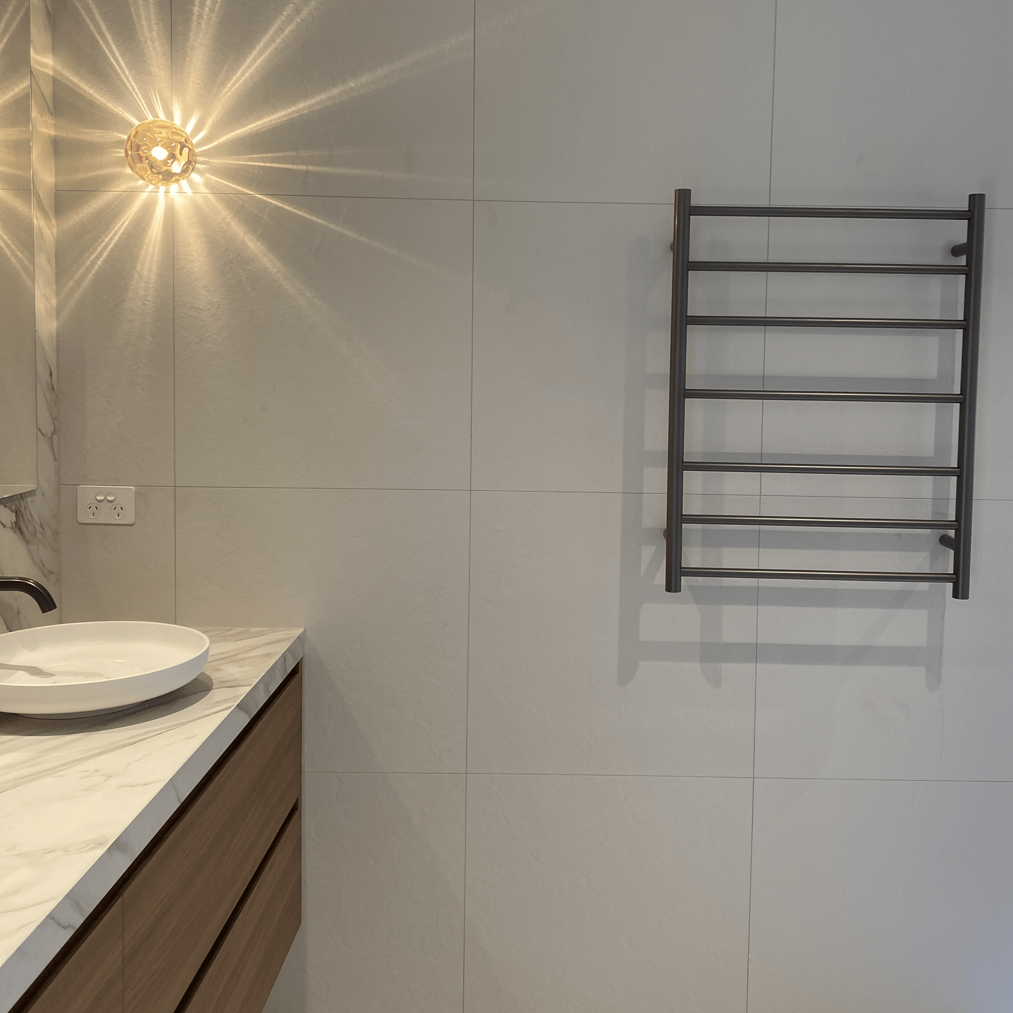 THERMORAIL - SR44MGM Gun Metal Round Ladder Heated Towel Rail - Heated Towel Rails - from our - THERMORAIL - supplier–available at Bathroom City Perth