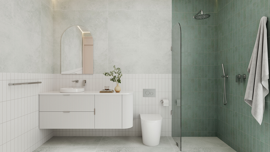 Modern bathroom with white vanity, mirror, and shower area.