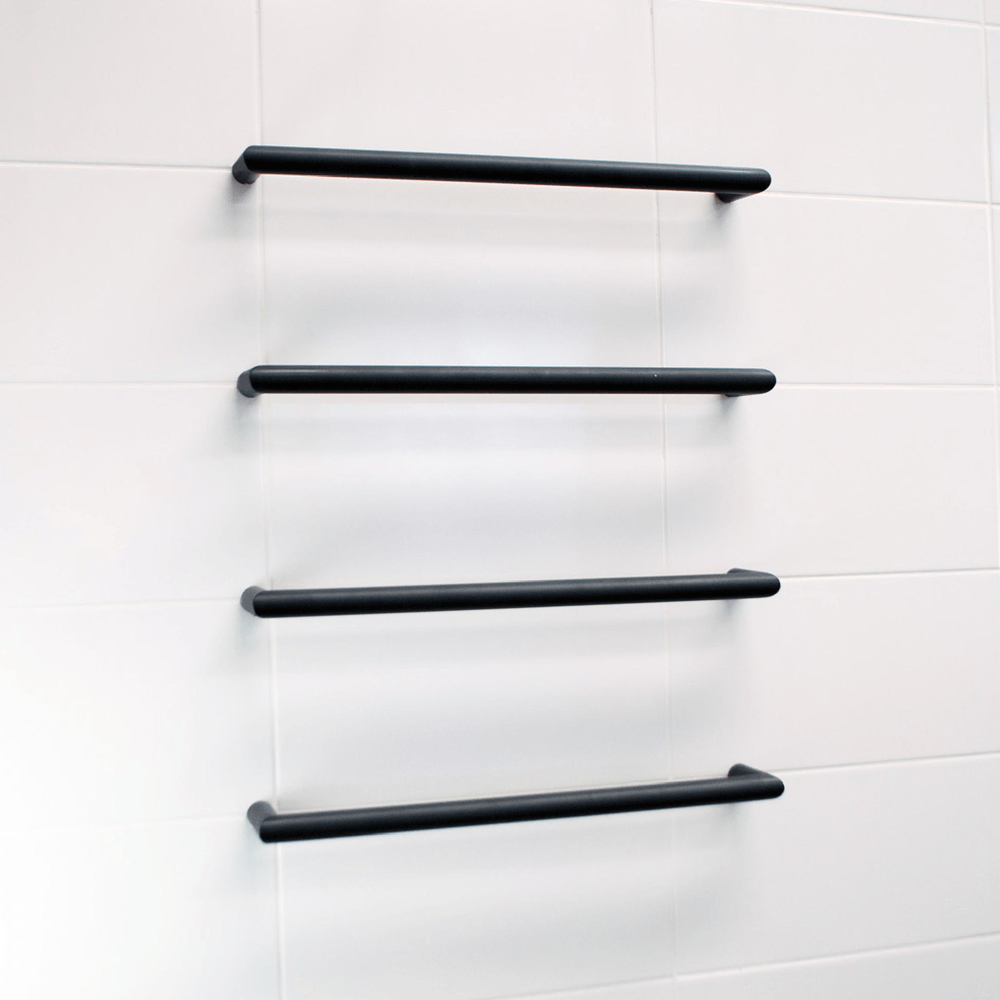 RADIANT - BSBRTR - 650 Heated Low Voltage Single Round Bar 650mm Matt Black - Heated Towel Rails - from our - Radiant - supplier–available at Bathroom City Perth