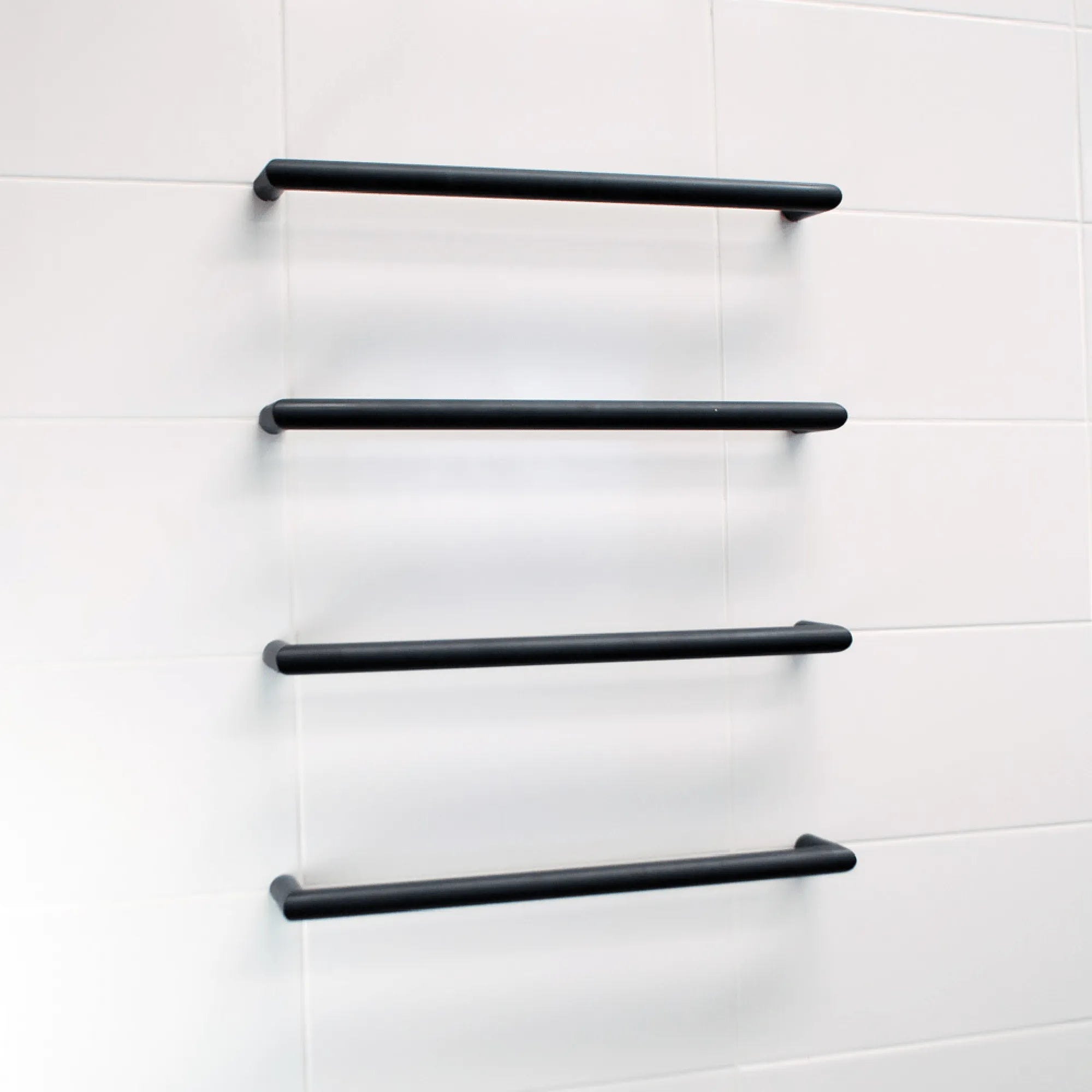 RADIANT - BSBRTR-650 Heated Low Voltage Single Round Bar 650mm Matt Black-Heated Towel Rails-from our-Radiant-supplier–available at Bathroom City Perth